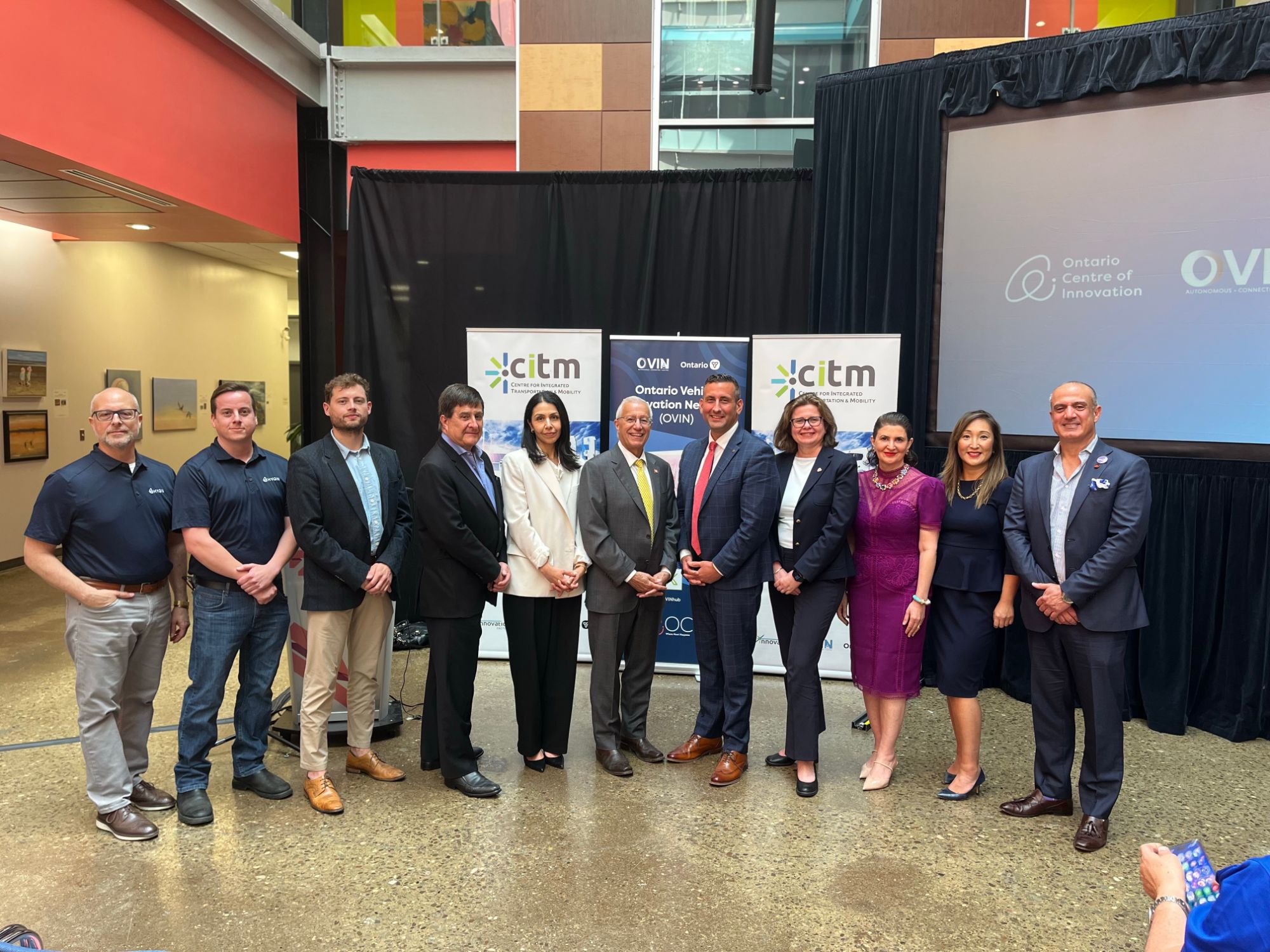Mapleview Energy and partners at the OVIN funding announcement event with CITM and Ontario Vehicle Innovation Network signage